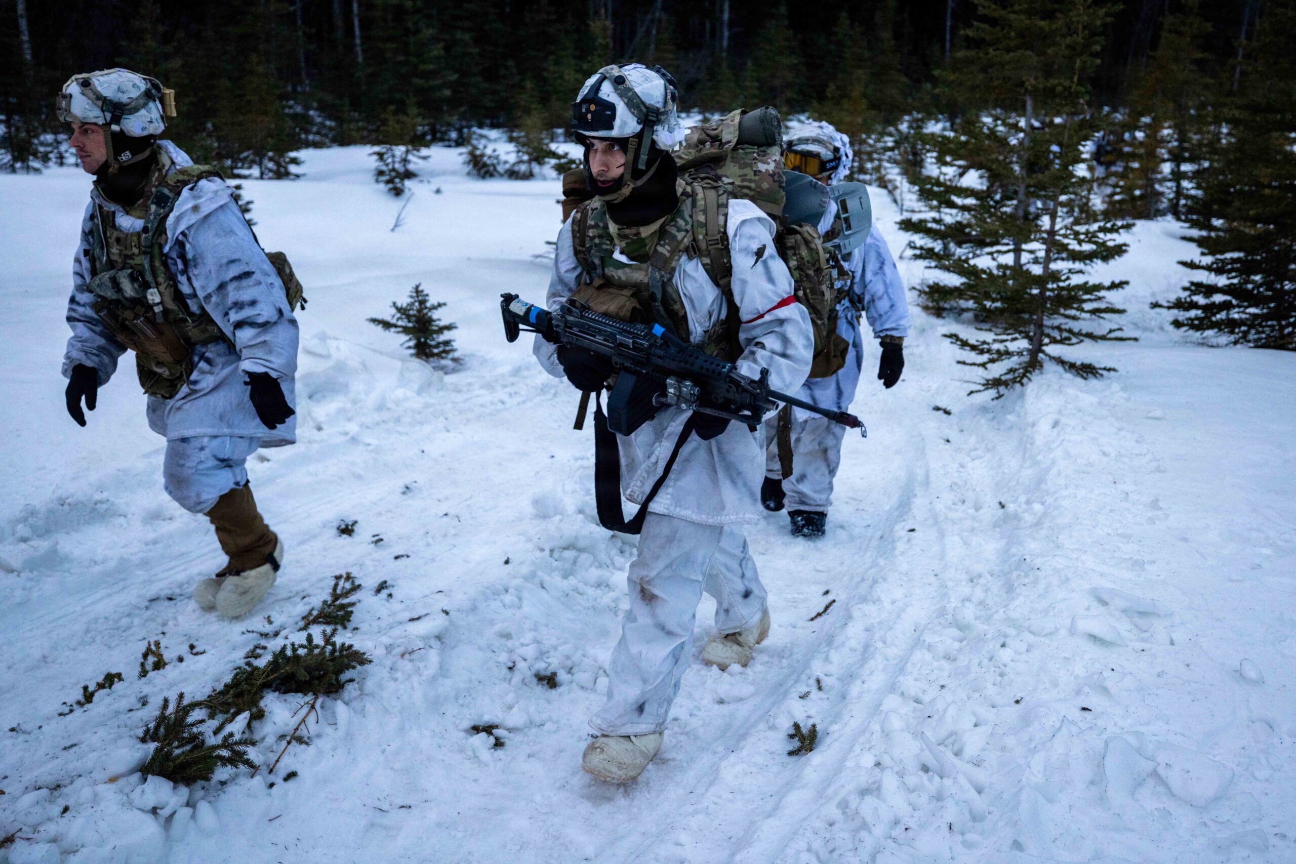 U.S. Army Soldiers with the 11th Airborne Division, load Air Force C-130 Hercules aircraft in preparation for deployment into the Joint Pacific Multinational Readiness Center’s 25-02 training exercise, Fairbanks, Alaska, Jan. 23, 2025. The training provided approximately ten thousand joint and multinational service members with vital Arctic operational experience and cold weather tactics, techniques and procedures. (U.S. Army Photo by Master Sgt. Justin P. Morelli)
