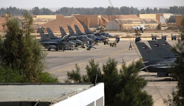 U.S. Air Force F-16 Fighting Falcon pilots with the 157th Fighter Squadron, 169th Fighter Wing, McEntire Joint National Guard Base, S.C., land after performing a flyover in formation during the 2009 Eager Tiger 10, Falcon Air Meet (FAM) Oct. 20, 2009, at Mwaffaq Salti Air Base, Azraq, Jordan. The formation was the first of several competitions among U.S., Jordanian and Belgium F-16 units. FAM's goal is to foster strong relationship between the U.S. and Middle Eastern countries and promote stability in the region. F-16 units from the United States, Belgium and Jordan are competing in this year's competition. (U.S. Air Force photo by Tech. Sgt. Caycee Cook/Released)