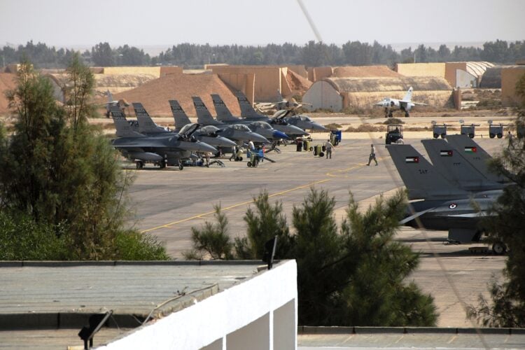 U.S. Air Force F-16 Fighting Falcon pilots with the 157th Fighter Squadron, 169th Fighter Wing, McEntire Joint National Guard Base, S.C., land after performing a flyover in formation during the 2009 Eager Tiger 10, Falcon Air Meet (FAM) Oct. 20, 2009, at Mwaffaq Salti Air Base, Azraq, Jordan. The formation was the first of several competitions among U.S., Jordanian and Belgium F-16 units. FAM's goal is to foster strong relationship between the U.S. and Middle Eastern countries and promote stability in the region. F-16 units from the United States, Belgium and Jordan are competing in this year's competition. (U.S. Air Force photo by Tech. Sgt. Caycee Cook/Released)