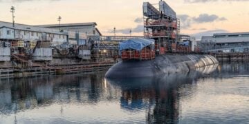 Virginia-class fast-attack submarine USS North Carolina (SSN 777) prepares to undock from Dry Dock 1 at Pearl Harbor Naval Shipyard and Intermediate Maintenance Facility (PHNSY & IMF) in Pearl Harbor, Hawaii, Aug. 12, 2026. The dry dock was flooded and the submarine prepared to return to the water following a period of scheduled maintenance. North Carolina was commissioned May 3, 2008. North Carolina is the fourth Virginia-class submarine and the fourth U.S. Navy ship to be named for the Tar Heel state. North Carolina is assigned to Submarine Squadron 1 and capable of supporting various missions, including anti-submarine warfare, anti-surface ship warfare, strike warfare, special operations support, and intelligence, surveillance, and reconnaissance. PHNSY & IMF’s mission is to keep the Navy’s fleet “Fit to Fight” by repairing, maintaining, and modernizing the Navy's fast-attack submarines and surface ships. Strategically located in the heart of the Pacific, it is the most comprehensive fleet repair and maintenance facility between the U.S. West Coast and the Far East. (U.S. Navy photo by Kenny Jones)