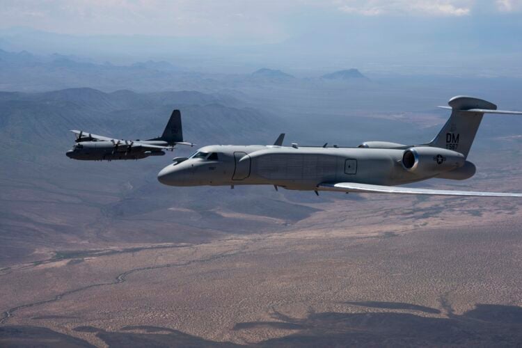 A U.S. Air Force EC-130H Compass Call aircraft and an EA-37B Compass Call aircraft assigned to the 55th Electronic Combat Group fly in formation over Southern Arizona, Sept. 3, 2026. Together in formation for the first time, the aircraft symbolize the continuation of a critical combat capability that enables U.S. and coalition forces to disrupt, deny and degrade adversary command and control networks. (U.S. Air Force photo by Senior Airman Devlin Bishop)