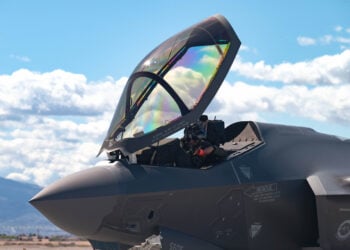 U.S. Air Force Maj. Zach Saunders, an F-35 division commander assigned to the 422nd Test and Evaluation Squadron, opens the canopy on an F-35 Lightning II after arrival at Nellis Air Force Base, Nevada, April 1, 2024. Saunders is engaging in Independent Pilot Off-station Procedures, which allows for aircrew to independently inspect and deploy their aircraft. (U.S. Air Force photo by Airman 1st Class Brianna Vetro)