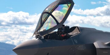 U.S. Air Force Maj. Zach Saunders, an F-35 division commander assigned to the 422nd Test and Evaluation Squadron, opens the canopy on an F-35 Lightning II after arrival at Nellis Air Force Base, Nevada, April 1, 2024. Saunders is engaging in Independent Pilot Off-station Procedures, which allows for aircrew to independently inspect and deploy their aircraft. (U.S. Air Force photo by Airman 1st Class Brianna Vetro)