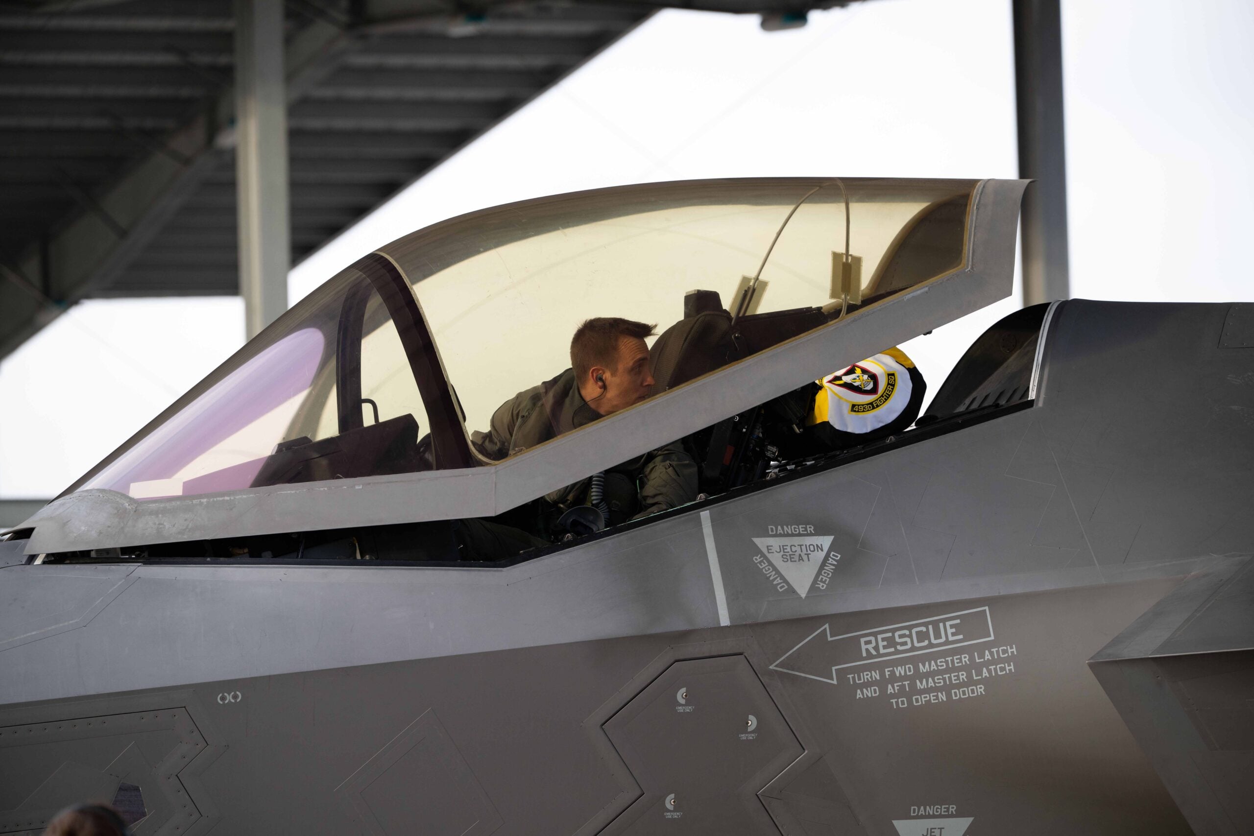 U.S. Air Force Maj. Jordan Rozsa, 493rd Fighter Squadron pilot, lowers the canopy of a F-35 Lightning II before a training mission across the Baltic states from RAF Lakenheath, Dec. 4, 2025. Training across the Baltic states aims to deepen the unity of effort essential to addressing Europe’s dynamic security environment, strengthening combined capabilities with NATO Allies through seamless, synchronized operations. (U.S. Air Force photo by Staff Sgt. Elizabeth Davis)