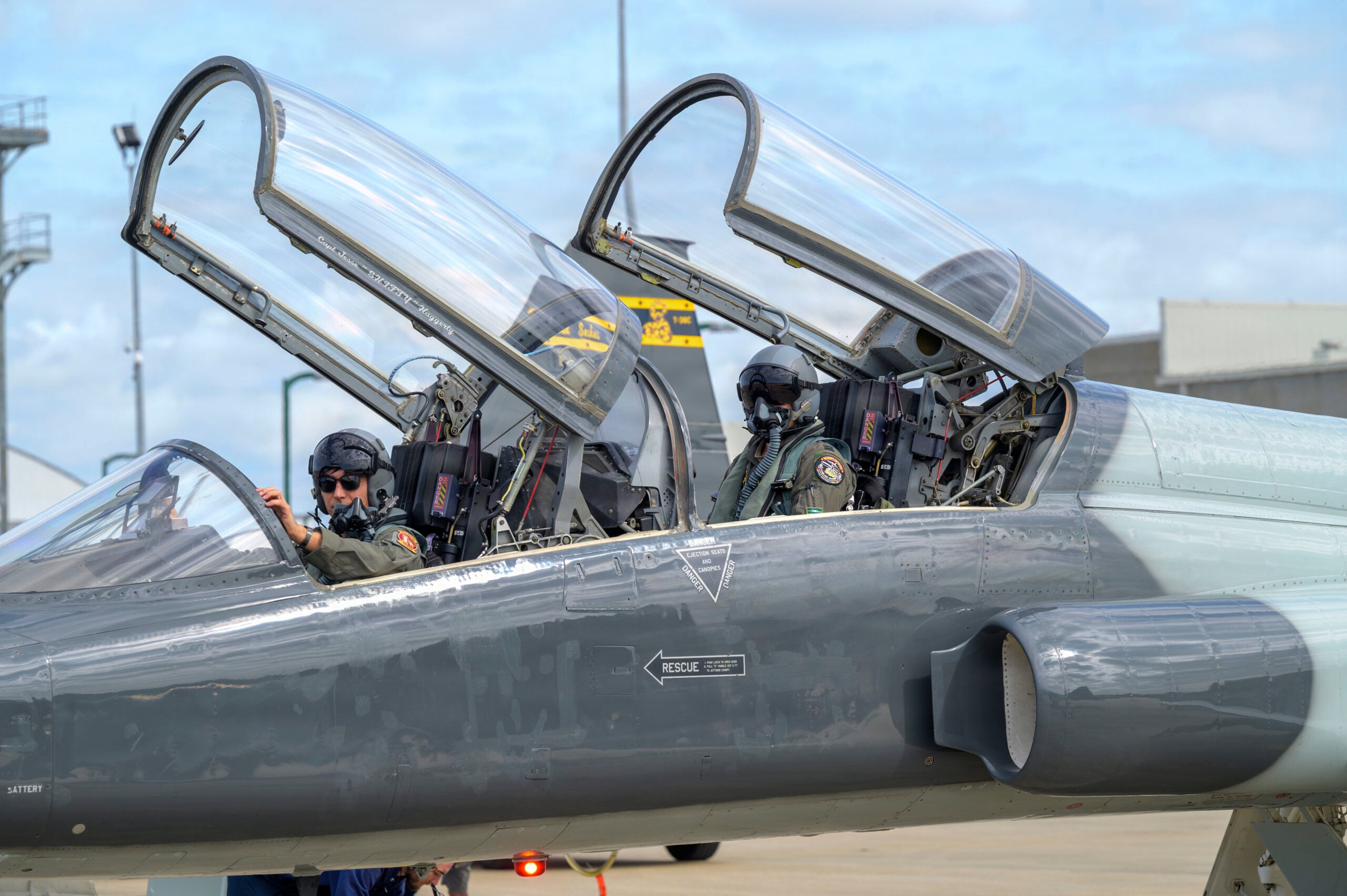 U.S. Air Force pilots assigned to the 14th Flying Training Wing at Columbus Air Force Base, Mississippi, conduct post-flight procedures on a T-38 Talon aircraft during exercise Sentry South 26-2, Gulfport, Mississippi, Feb. 25, 2026. Sentry South 26-2 is a large force employment exercise focused on major combat operations and joint maritime opportunities in a contested or degraded operational environment. Sentry South 26-2 applies joint and combined warfighting doctrine against realistic and robust enemy integrated threat systems, all while under safe and controlled conditions. (U.S. Air National Guard photo by Staff Sgt. Dylan McCrink)